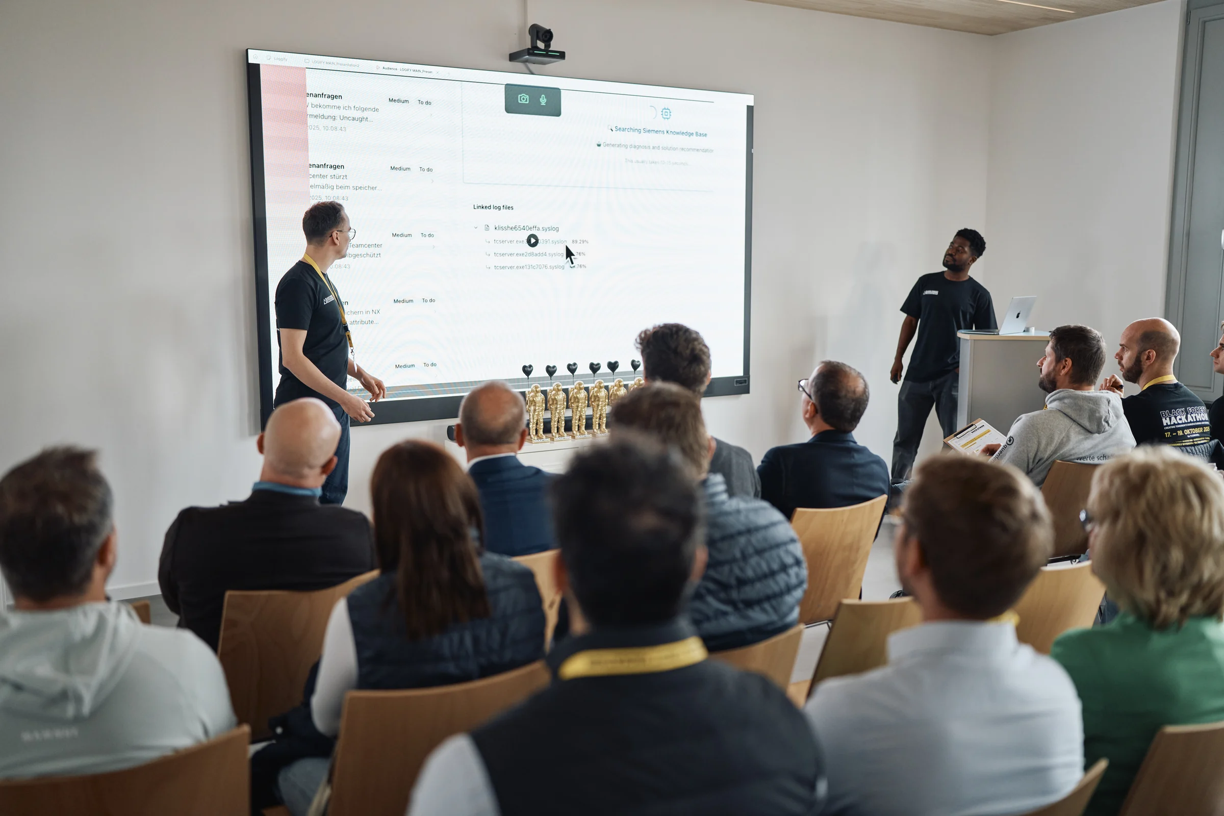 Participants at a Corporathon AI hackathon