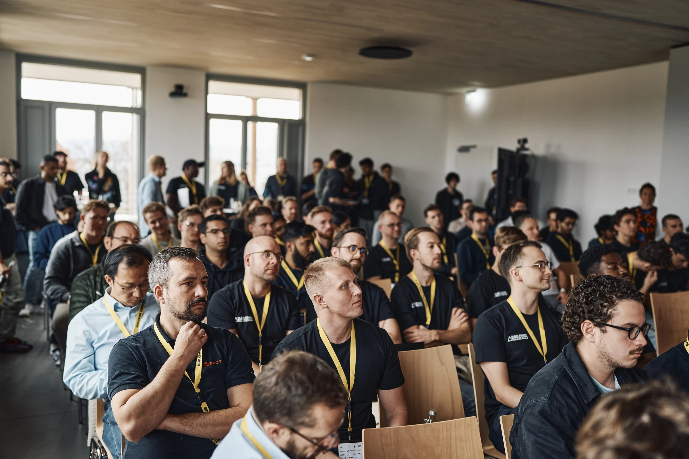 Participants at a Corporathon AI hackathon